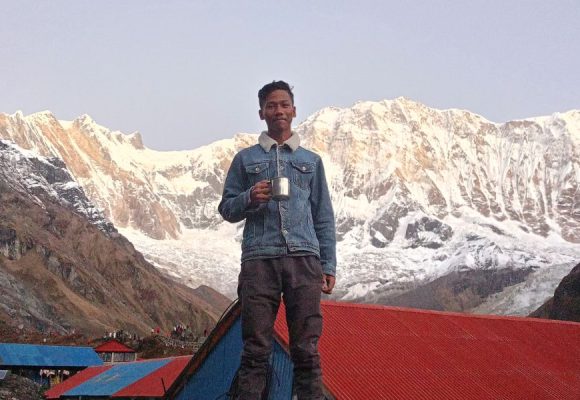 Mt Annapurna ranges with a single boy